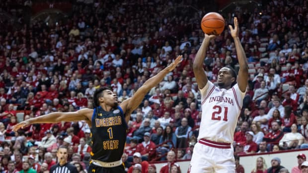 Indiana Hoosiers forward Mackenzie Mgbako (21) shoots the ball while Morehead State Eagles guard Jerone Morton (1) defends at Simon Skjodt Assembly Hall.