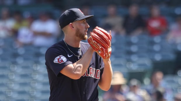 Sep 10, 2023; Anaheim, California, USA; Cleveland Guardians starting pitcher Tanner Bibee (61) prepares to throw to a Los Angeles Angels batter during the first inning of a game at Angel Stadium. Mandatory Credit: Jessica Alcheh-USA TODAY Sports