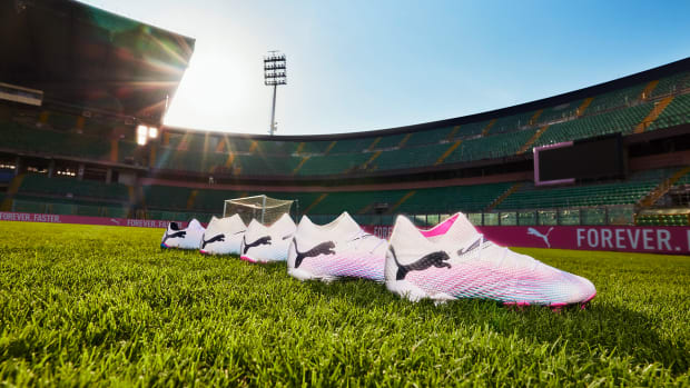 Side view of PUMA soccer cleats.