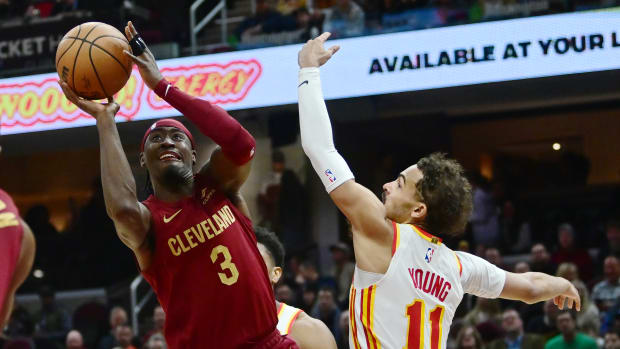 Dec 16, 2023; Cleveland, Ohio, USA; Cleveland Cavaliers guard Caris LeVert (3) drives to the basket against Atlanta Hawks guard Trae Young (11) during the second half at Rocket Mortgage FieldHouse. Mandatory Credit: Ken Blaze-USA TODAY Sports  