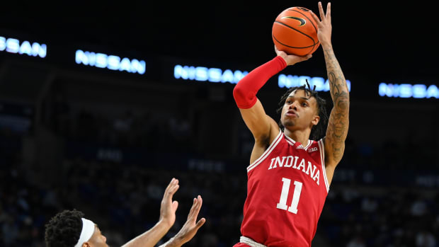 Indiana Hoosiers guard CJ Gunn (11) shoots the ball as Penn State Nittany Lions guard Jalen Pickett (left) defends during the second half at the Bryce Jordan Center.