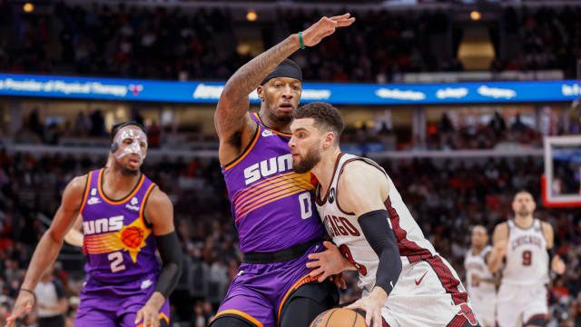 Mar 3, 2023; Chicago, Illinois, USA; Chicago Bulls guard Zach LaVine (8) drives to the basket against Phoenix Suns forward Torrey Craig (0) during the second half at United Center.
