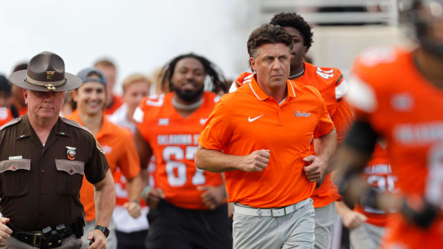 Sep 16, 2023; Stillwater, Oklahoma, USA; Oklahoma State coach Mike Gundy takes the field before an NCAA football game between Oklahoma State and South Alabama at Boone Pickens Stadium. South Alabama won 33-7. Mandatory Credit: Bryan Terry-USA TODAY Sports