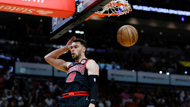 Apr 14, 2023; Miami, Florida, USA; Chicago Bulls guard Zach LaVine (8) reacts after dunking the basketball during the third quarter against the Miami Heat at Kaseya Center.