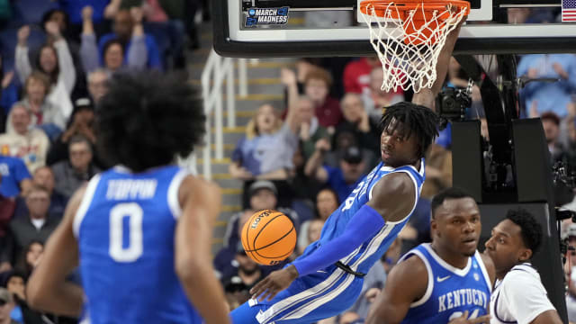 Mar 19, 2023; Greensboro, NC, USA; Kentucky Wildcats forward Chris Livingston (24) reacts to a basket during the first half against the Kansas State Wildcats in the second round of the 2023 NCAA men s basketball tournament at Greensboro Coliseum.