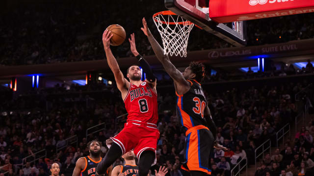Dec 23, 2022; New York, New York, USA; Chicago Bulls guard Zach LaVine (8) drives to the basket as New York Knicks forward Julius Randle (30) defends during the fourth quarter at Madison Square Garden.