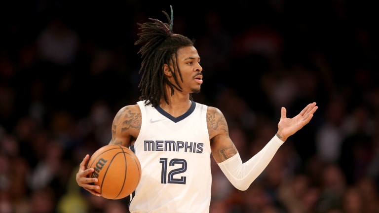 Ja Morant Gives Game-Worn Signature Shoes to Fan - Sports Illustrated  FanNation Kicks News, Analysis and More