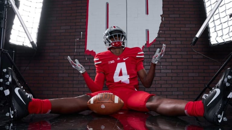 Ohio State top commit Jeremiah Smith reacts after Georgia recruiting visit