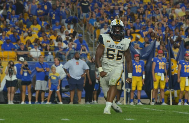 Backyard Brawl Game Photo Gallery - Sports Illustrated West Virginia ...