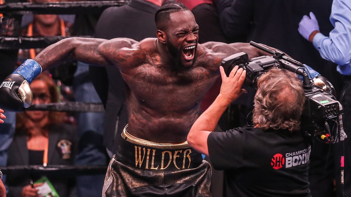 How much did Tyson Fury and Deontay Wilder make in their first two fights?