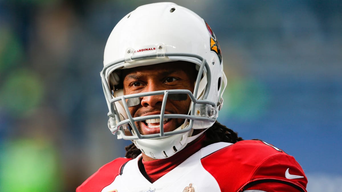 Larry Fitzgerald gets a hole in one, with former President Obama as witness