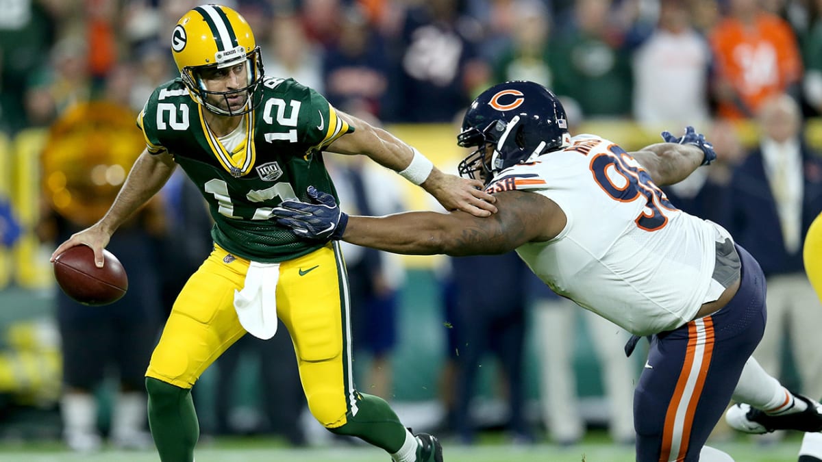 Chicago Bears' Roy Robertson-Harris sacks Green Bay Packers' Aaron Rodgers  during the first hal …