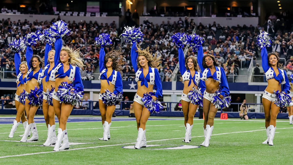 This Dallas Cowboys Cheerleader, Victoria (the team does not publicize the  last names of its cheerleading squad members), and and about 35 others,  entertain the crowd at a National Football League game