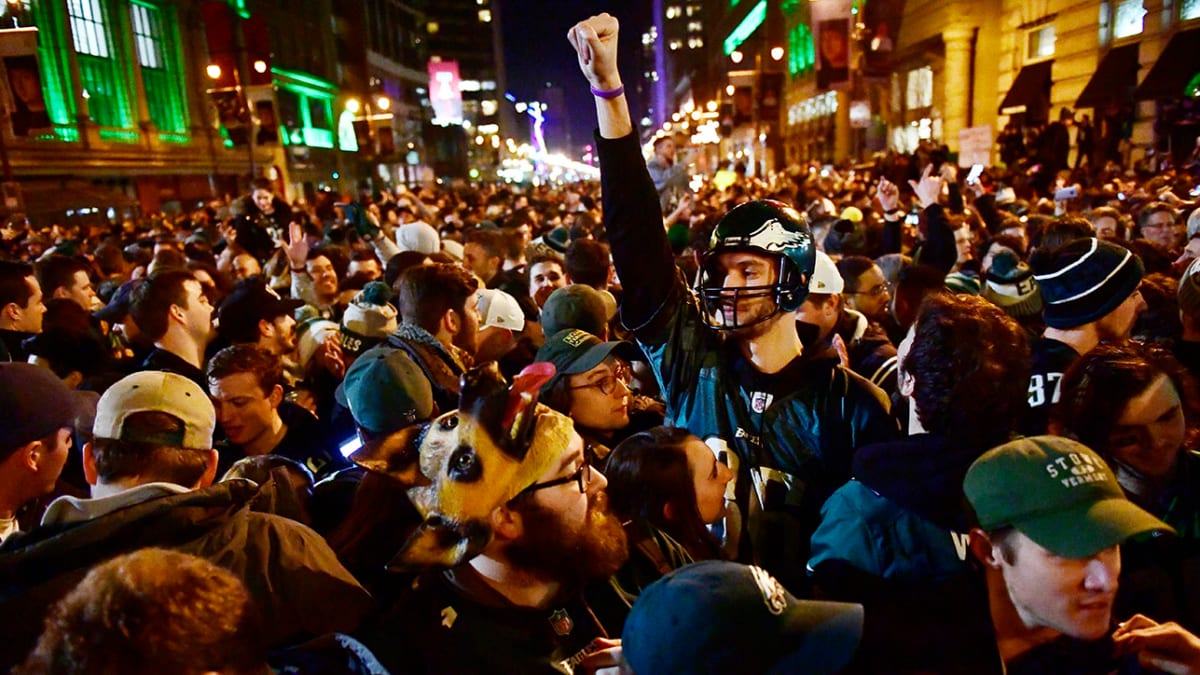 Philadelphia Eagles fans celebrate in the stands during the fourth