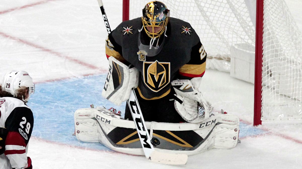 Pittsburgh Penguin goalie Marc-Andre Fleury blocks a shot in the