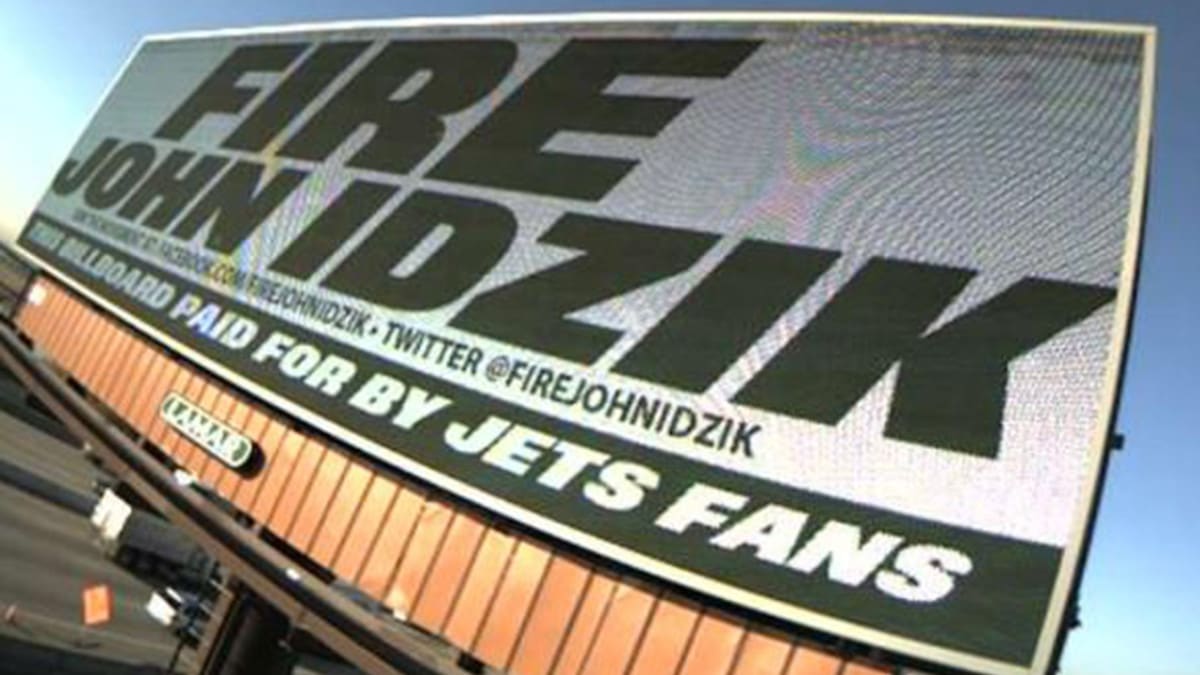 New York Jets fans Christmas card features 'Fire John Idzik' billboard -  Sports Illustrated