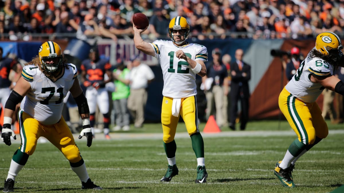 Green Bay Packers receiver Jordy Nelson (87) and quarterback Aaron Rodgers  (12) are all smiles after the two teamed up for a touchdown against the  Chicago Bears in the fourth quarter at