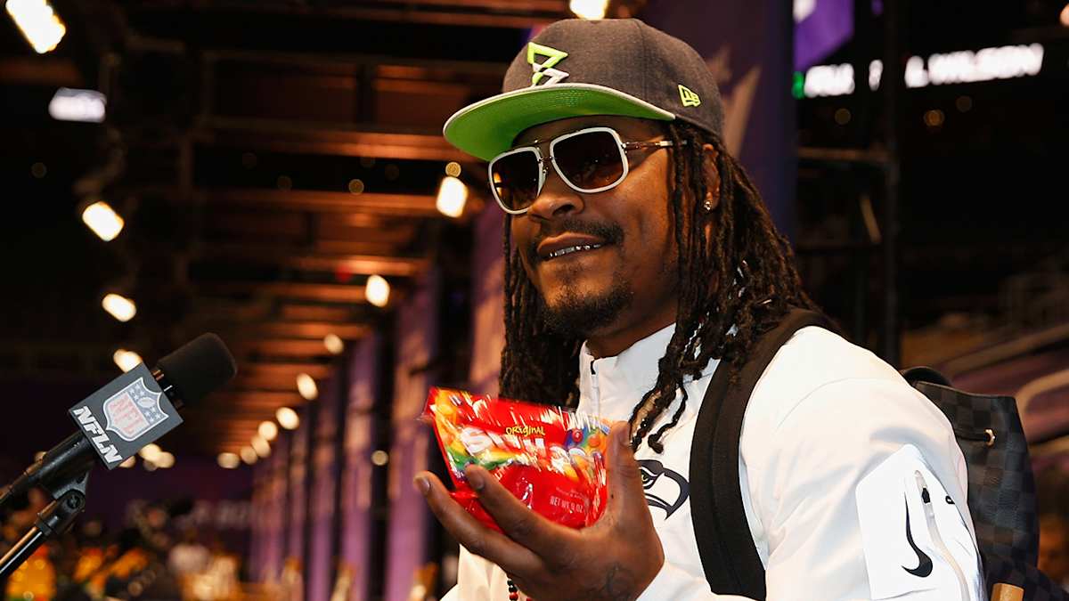 Seahawks' Marshawn Lynch sells Skittles in home shopping network promo