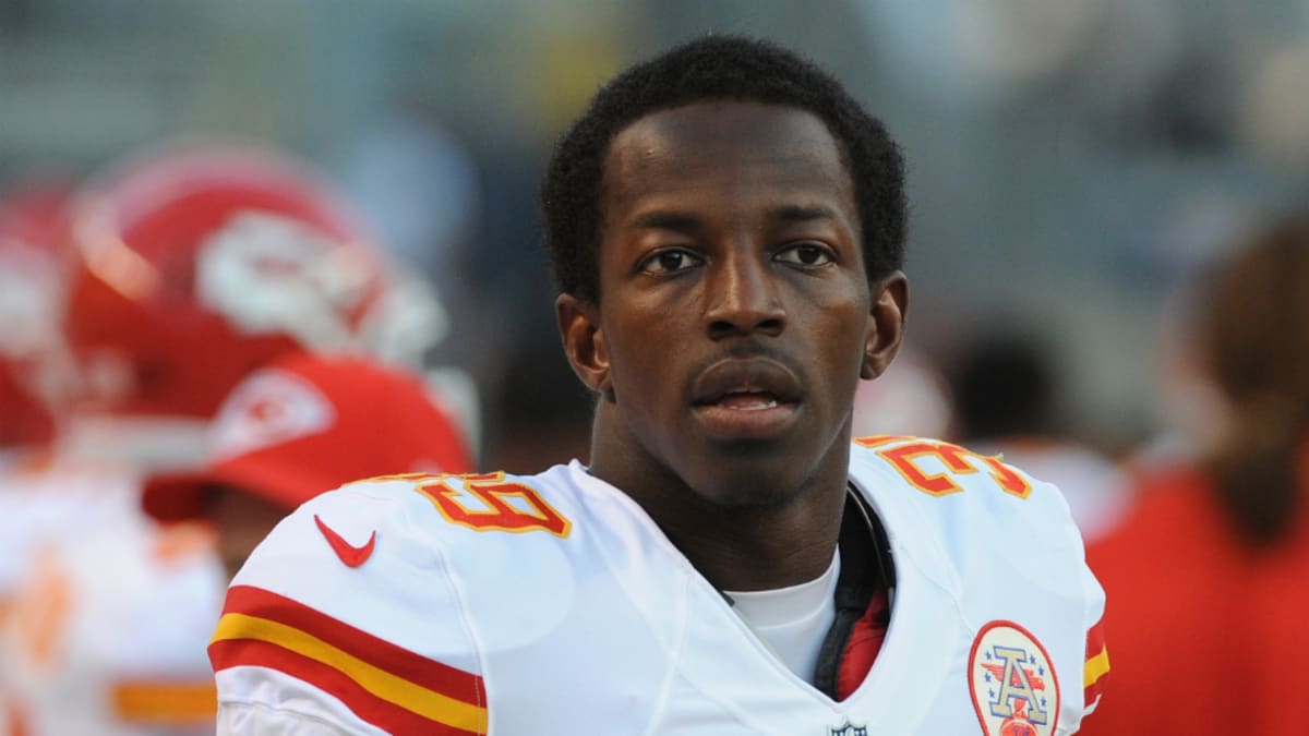 Kansas City Chiefs free safety Husain Abdullah carries the ball after  intercepting a pass and running it back 39 yards for a touchdown during the  fourth quarter of an NFL football game