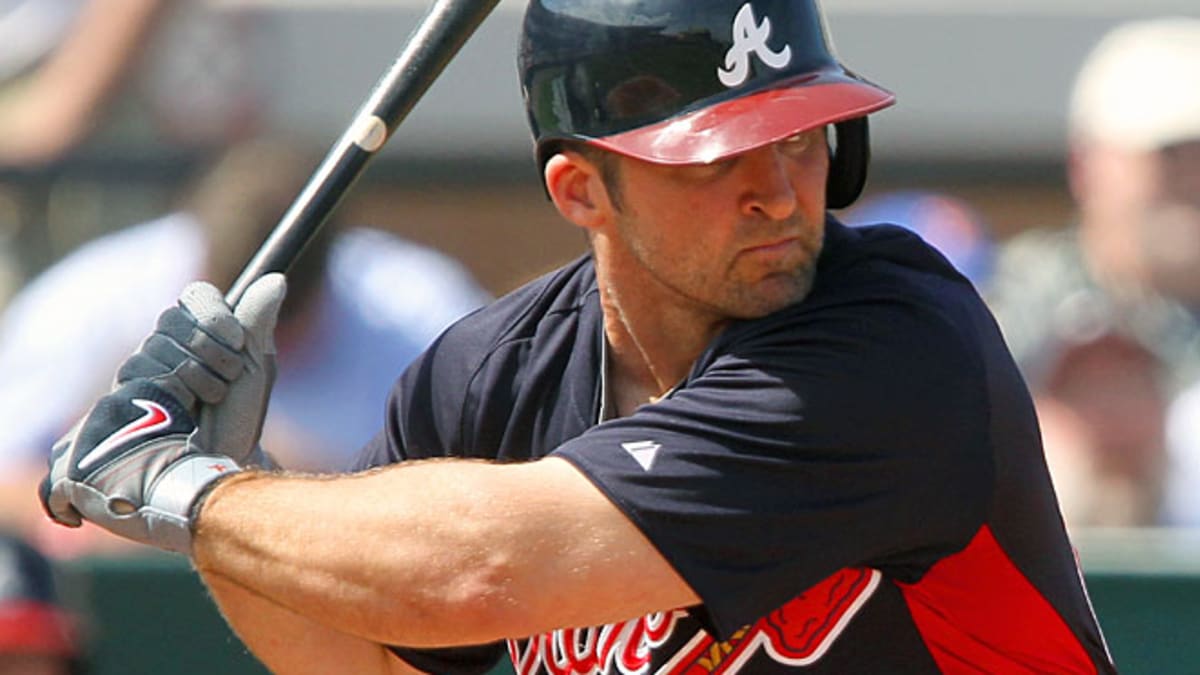 Braves' Uggla hit in neck by pitch, says he's OK