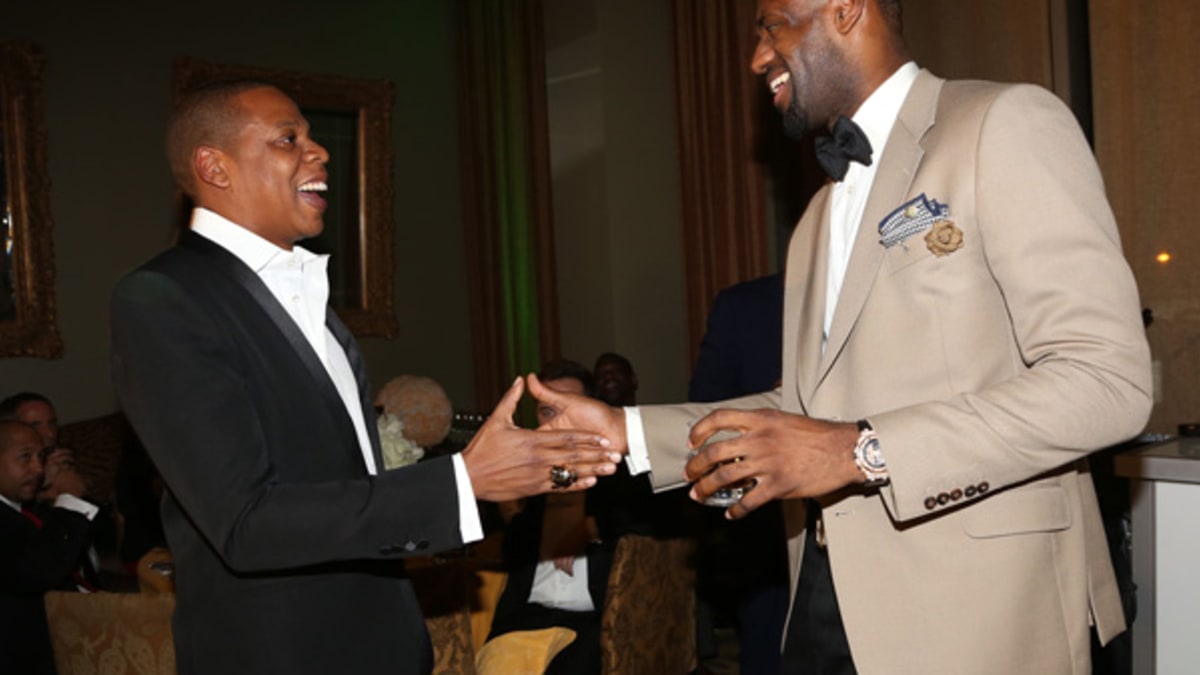 Jay-Z endorses Obama In Suit and Tie and Brooklyn Nets Cap
