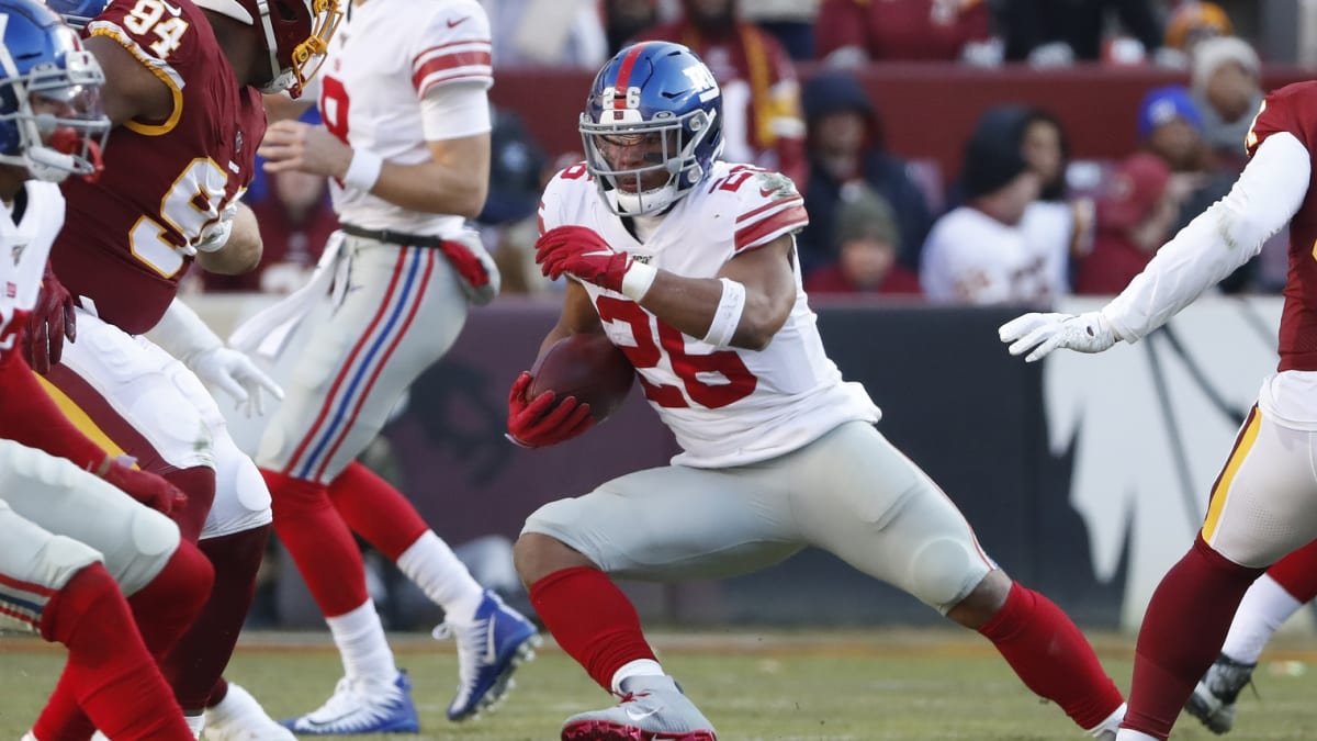 Saquon Barkley breaks a decades-long offensive drought for the Giants on Thanksgiving  Day 