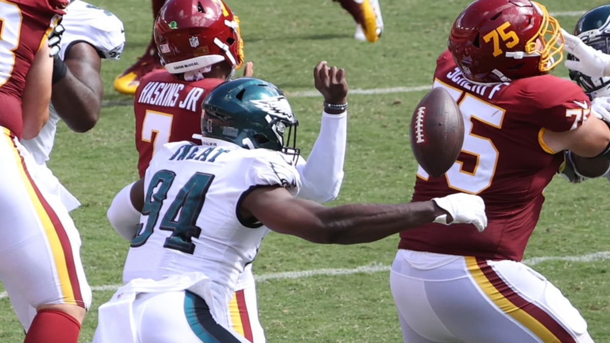 Philadelphia Eagles defensive end Josh Sweat (94) rushes during an