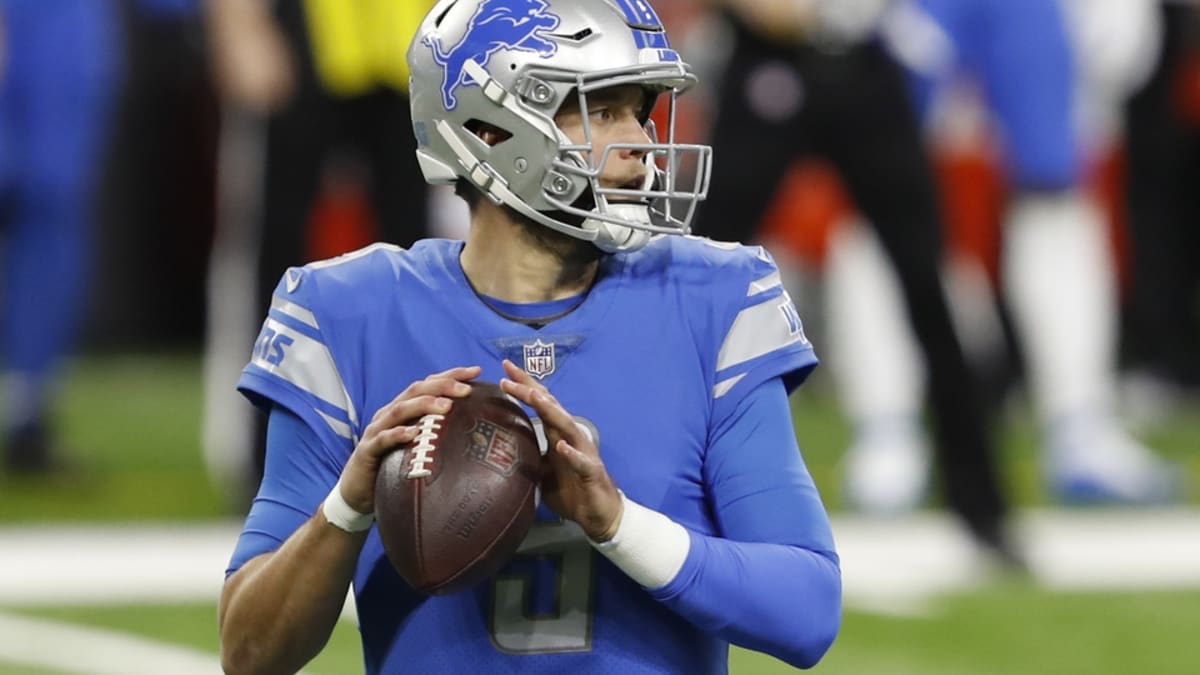 Detroit Lions quarterback Matthew Stafford wears a baseball cap sitting on  the bench after being replaced in the fourth quarter with a large lead over  the Denver Broncos at Sports Authority Field