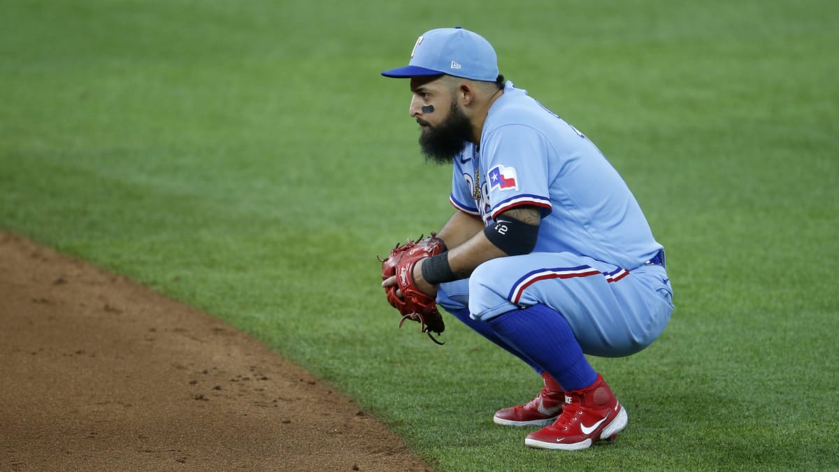 Texas Rangers' Rougned Odor gives a post game interview dripping wet after  being doused by teammates following their 10-0 win against the Los Angeles  Angels in a baseball game, Friday, July 7