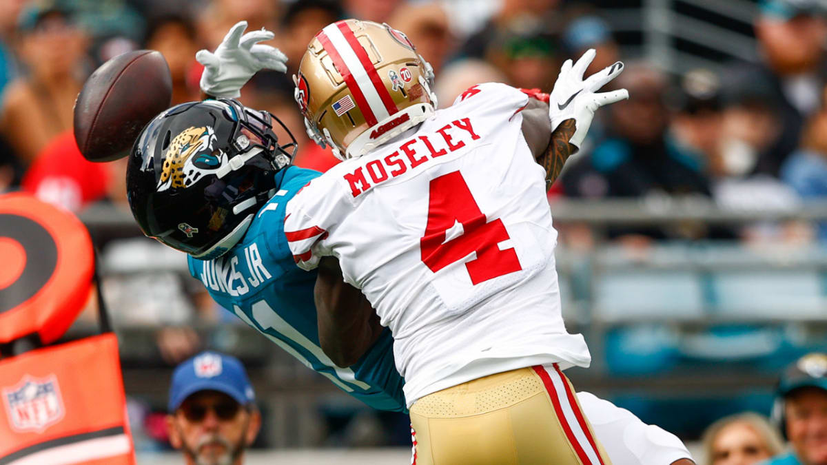 San Francisco 49ers defensive back Emmanuel Moseley, left, breaks up a pass  intended for Seattle Seahawks wide receiver D.K. Metcalf during overtime of  an NFL football game in Santa Clara, Calif., Monday