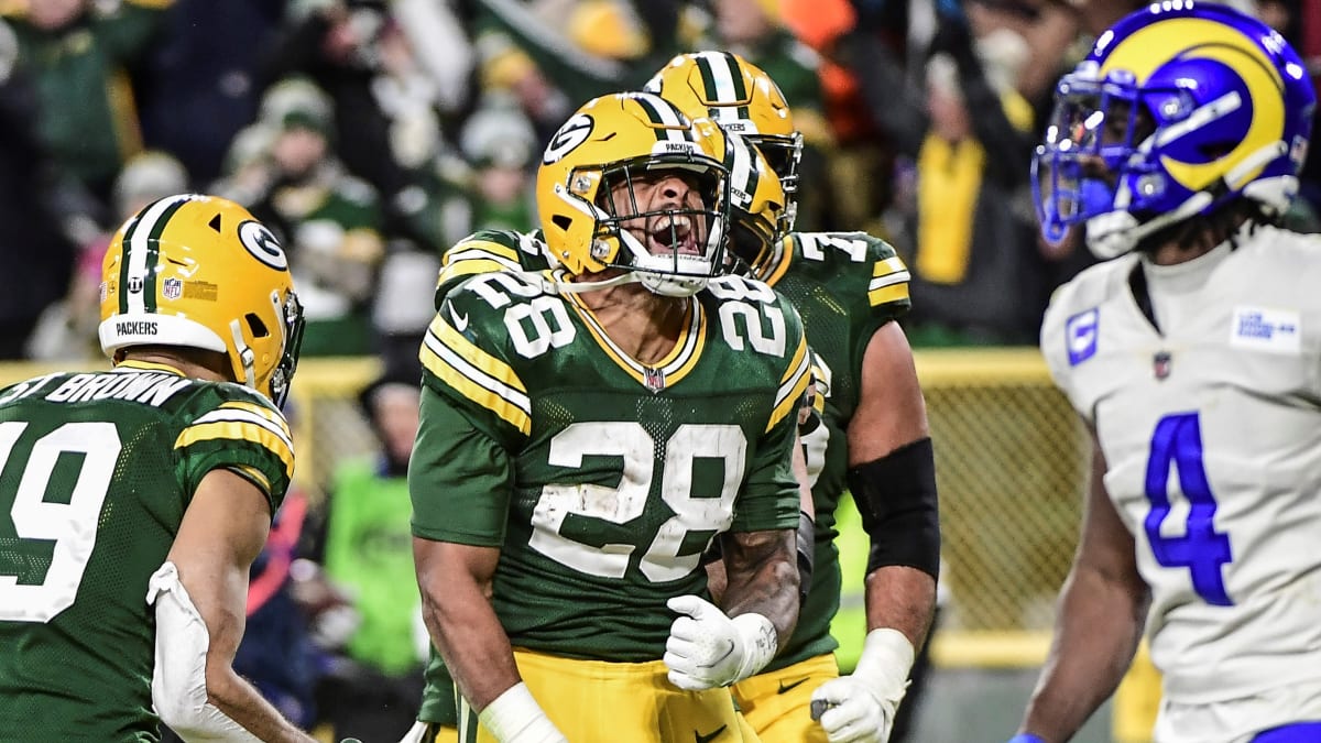 AJ Dillon helps Packers power past Rams, 36-28, as Aaron Jones returns