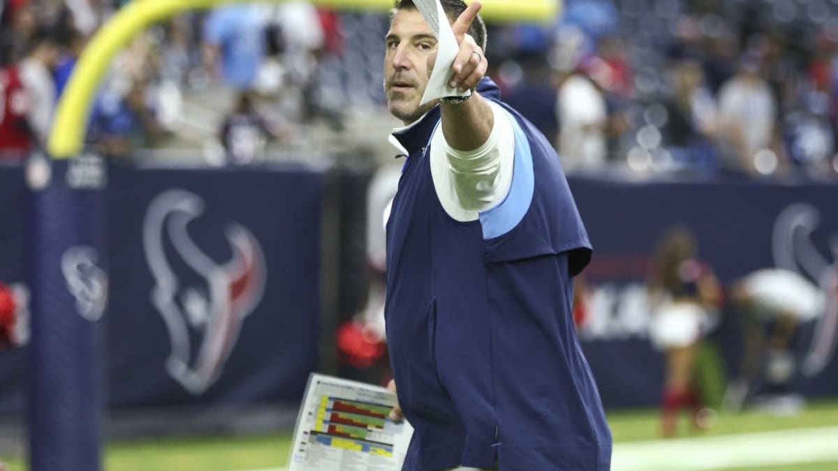 Tennessee Titans coach Mike Vrabel walks out of Friday's press conference