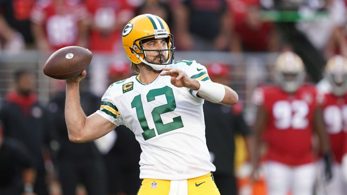 San Francisco, California, USA. 12th Jan, 2013. Green Bay Packers  quarterback Aaron Rodgers (12) passes down field on Saturday at Candlestick  Park in San Francisco, CA. The 49ers defeated the Packers 45-31