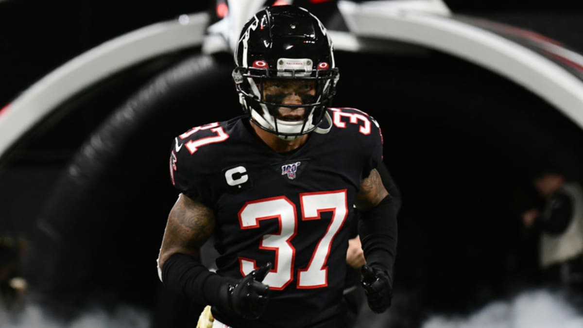 Atlanta Falcons safety Ricardo Allen (37) runs out of the smoke during pre- game introductions in a week 4 NFL football game against the Tennessee  Titans, Sunday, Sep. 29, 2019 in Atlanta. (Michael