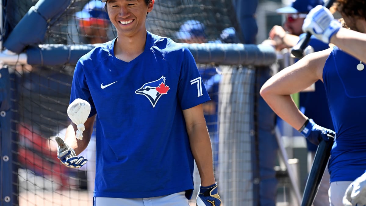 Gosuke Katoh of the Toronto Blue Jays in the dugout ahead of their