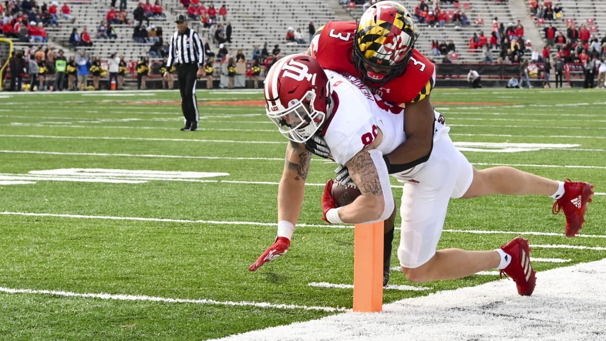 Bloomington, United States. 13th Nov, 2021. Peyton Hendershot (86) of the  Indiana Hoosiers is tackled by Shaquan Loyal (25) of the Rutgers Scarlet  Knights during an NCAA football game at Memorial Stadium.