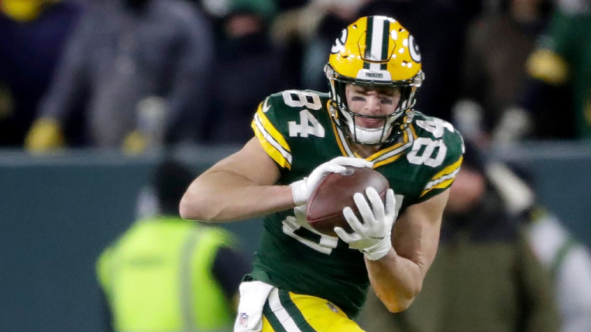 Green Bay, Wisconsin, USA. 1st Jan, 2023. Green Bay Packers tight end Tyler  Davis (84), Green Bay Packers tight end Josiah Deguara (81), and Green Bay  Packers quarterback Aaron Rodgers (12) celebrate