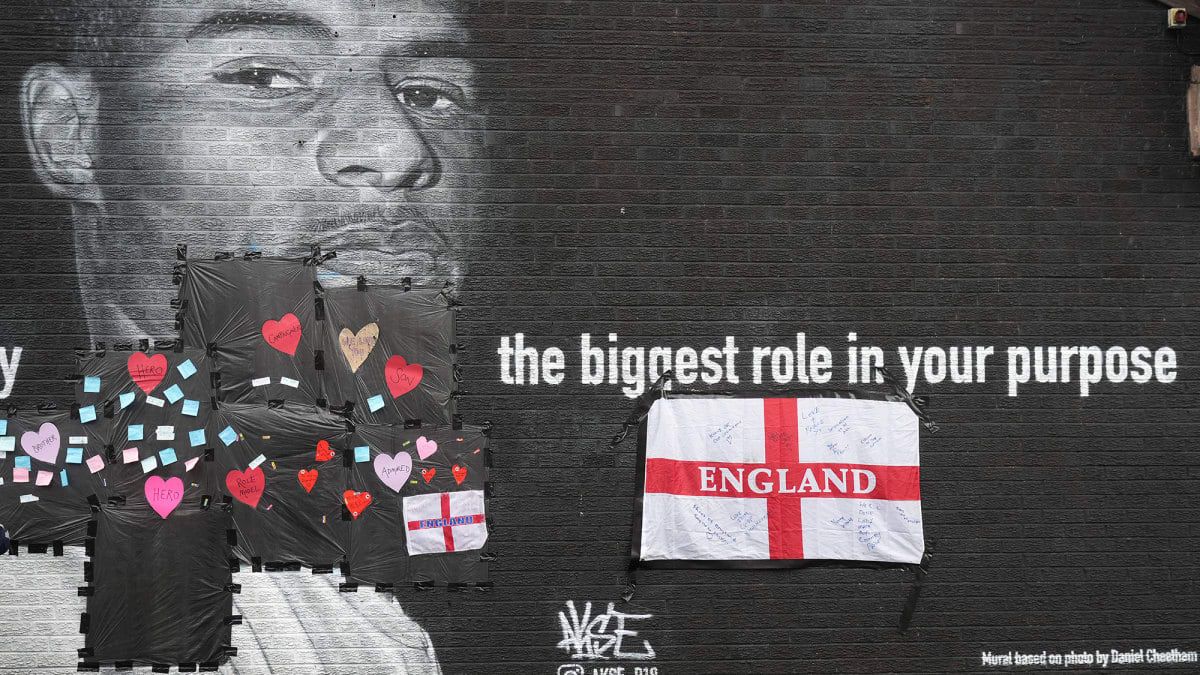 Defaced UK soccer star mural transformed into symbol of anti