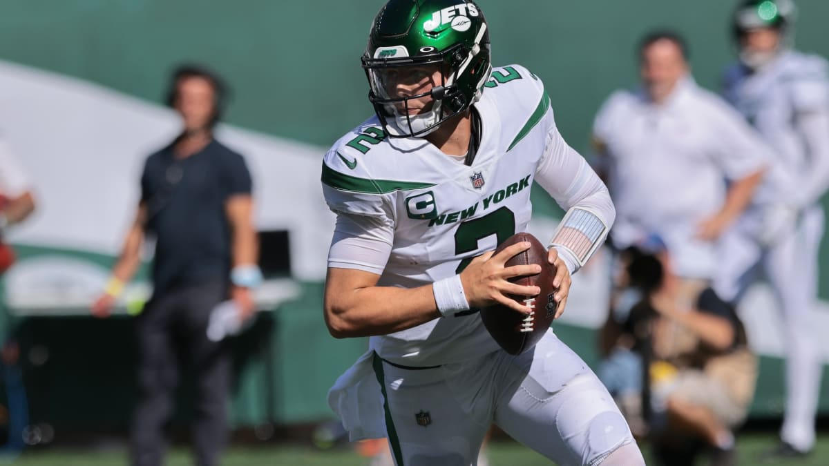 New York Jets quarterback Zach Wilson looks to pass during the