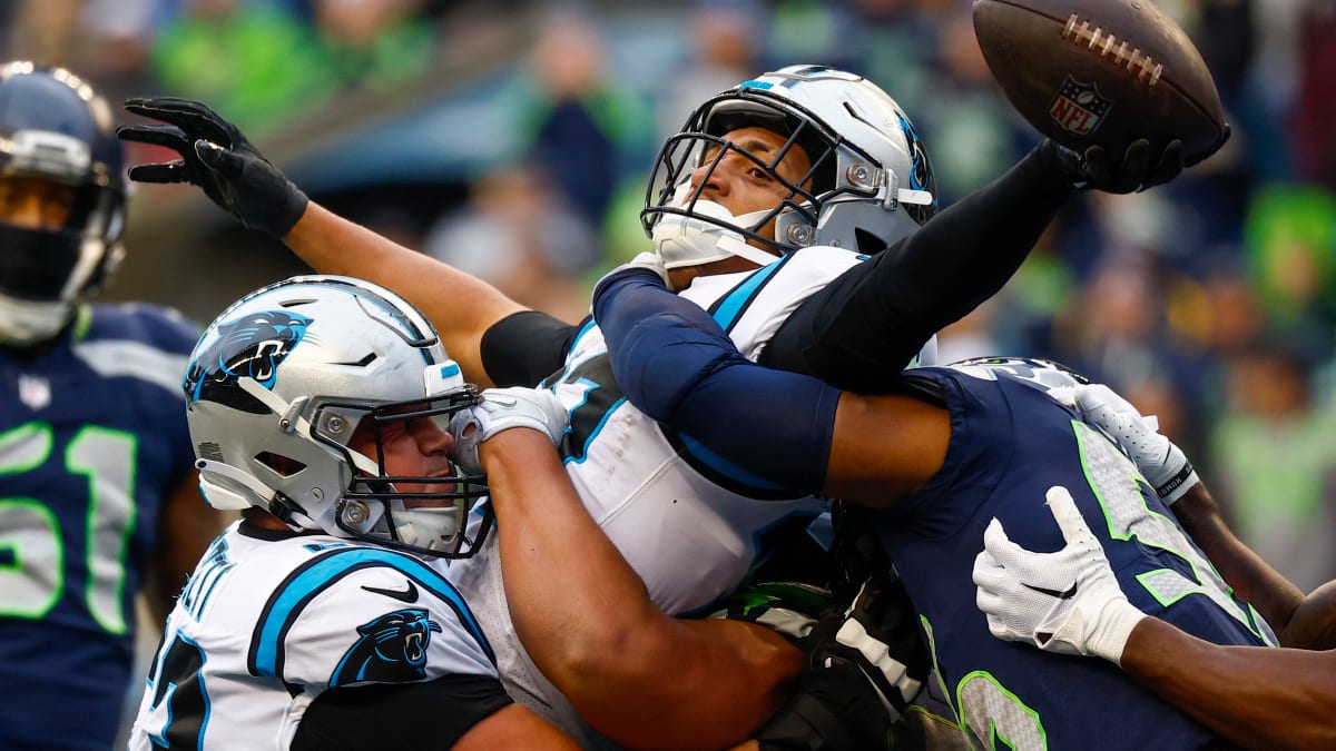 Seattle Seahawks quarterback Geno Smith (7) walks off the filed after an  NFL football game against the Carolina Panthers, Sunday, Dec. 11, 2022, in  Seattle, WA. The Panthers defeated the Seahawks 30-24. (