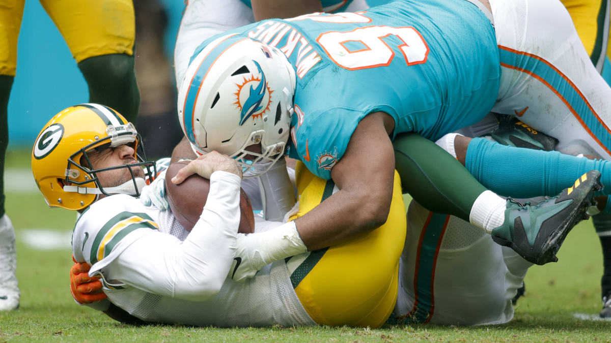 Green Bay Packers' Aaron Rodgers is sacked by Miami Dolphins