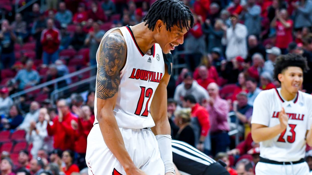 Louisville fan celebrates Louisville with the biggest head tattoo