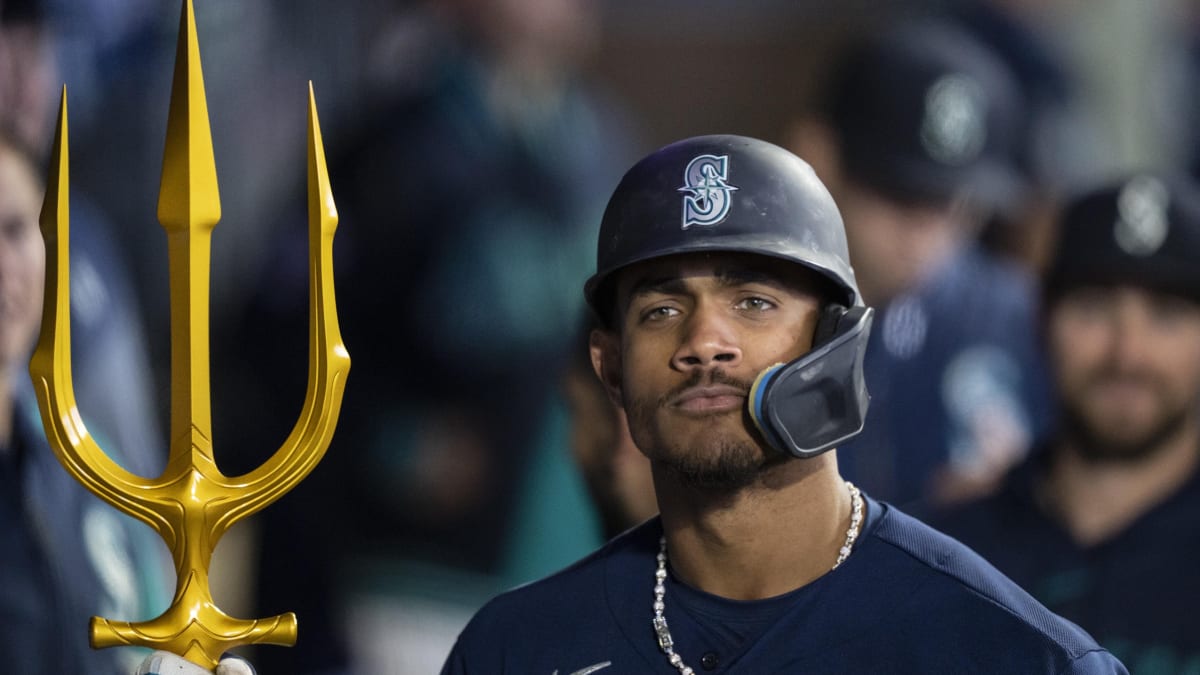 Seattle Mariners players embrace Home Run Trident