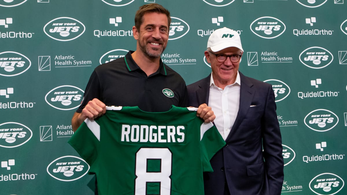 New York Jets owner Robert Woody Johnson, left, walks with former Jets  quarterback Joe Namath before an NFL football game between the Jets and the Miami  Dolphins at Giants Stadium in East