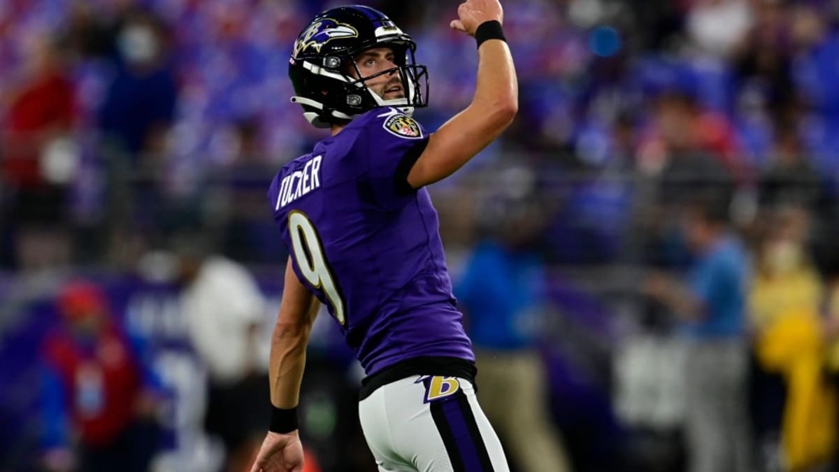 Baltimore Ravens' Justin Tucker (9) slips after a field goal