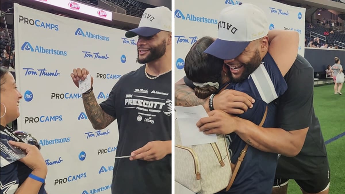 Dak Prescott helps a Cowboys fan with a baby gender reveal during