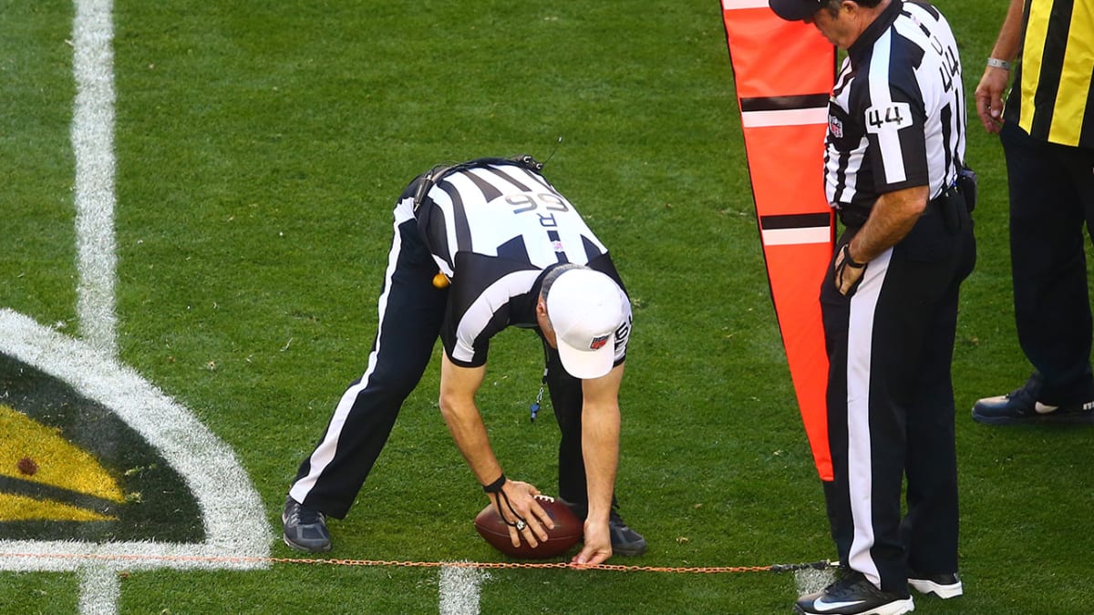 Referee throws flag over 30 yards (GIF)