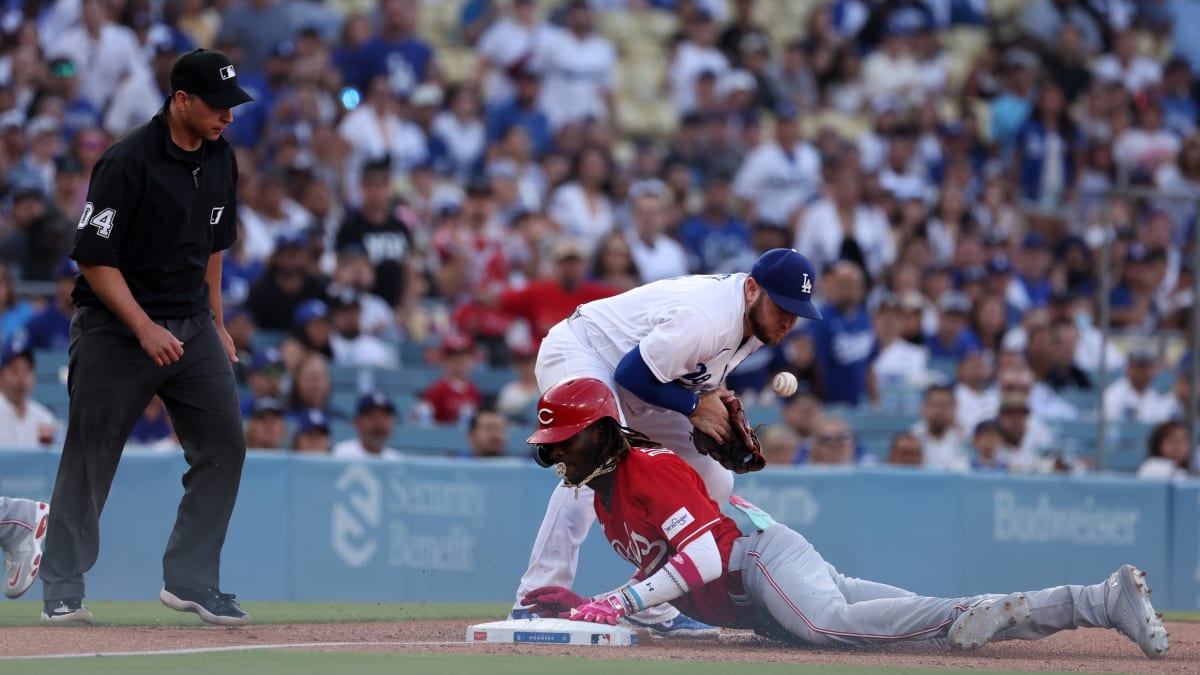 Encarnacion-Strand homers in 9th as Cincinnati beats Toronto