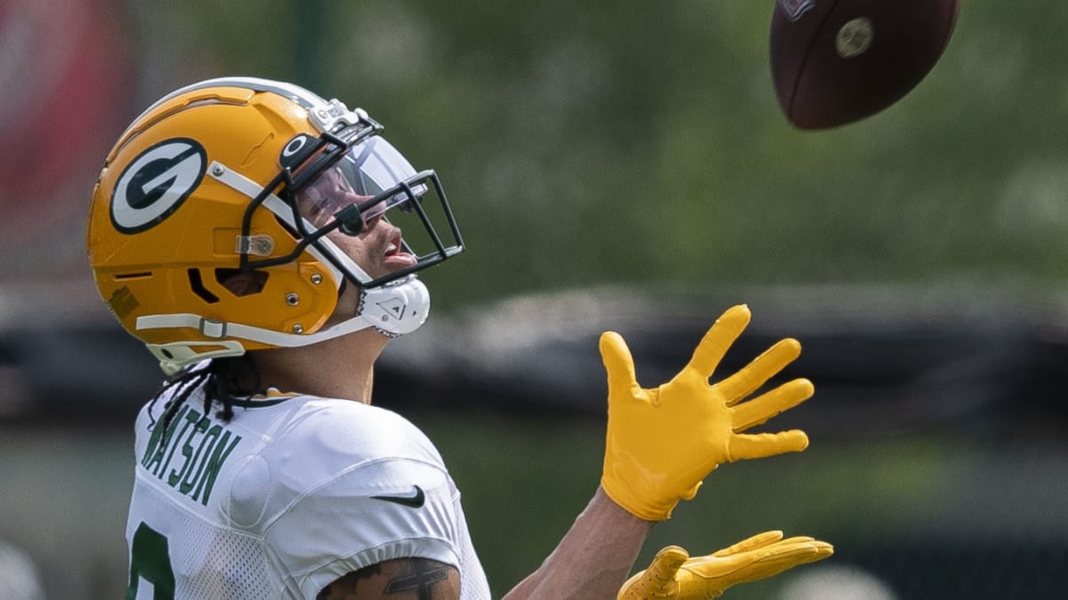 Green Bay Packers' T.J. Slaton runs a drill at the NFL football