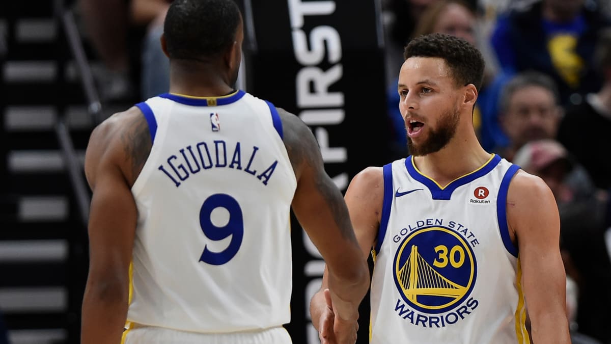 Watch: Steph Curry welcomes Andre Iguodala back to the Warriors